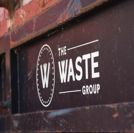 the waste group logo on a skip