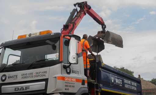 loading a skip lorry