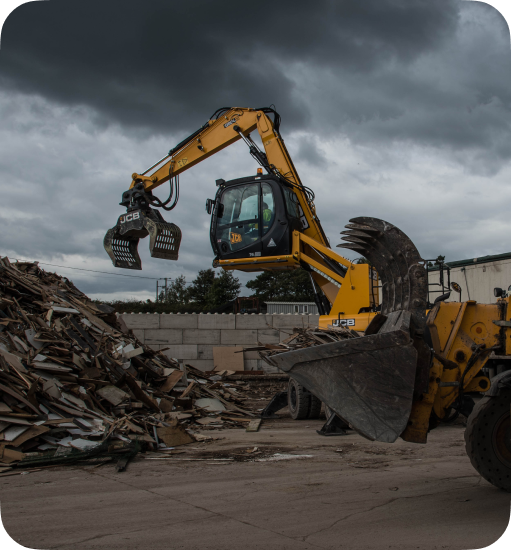 excavators on a tipping facility