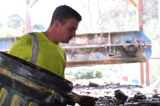 waste group employees sorting trash