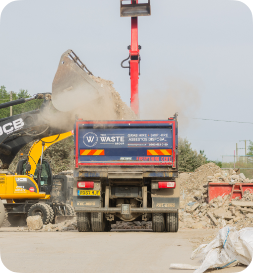 loading a waste group's grab lorry