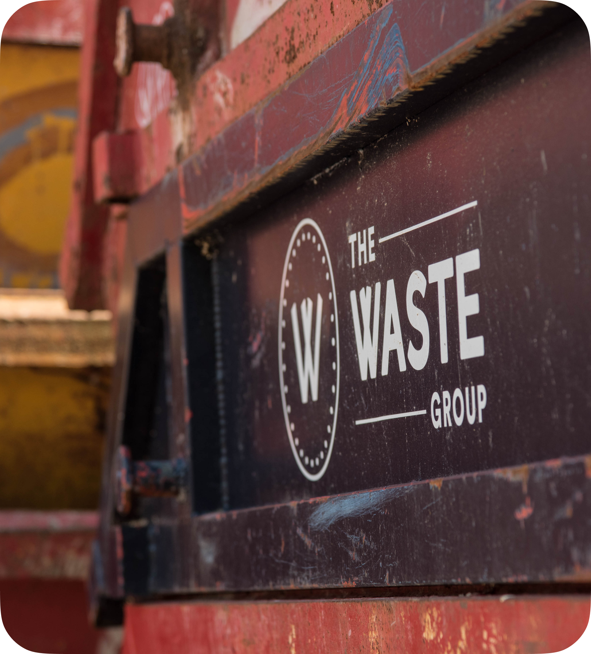 a skip with a waste group logo