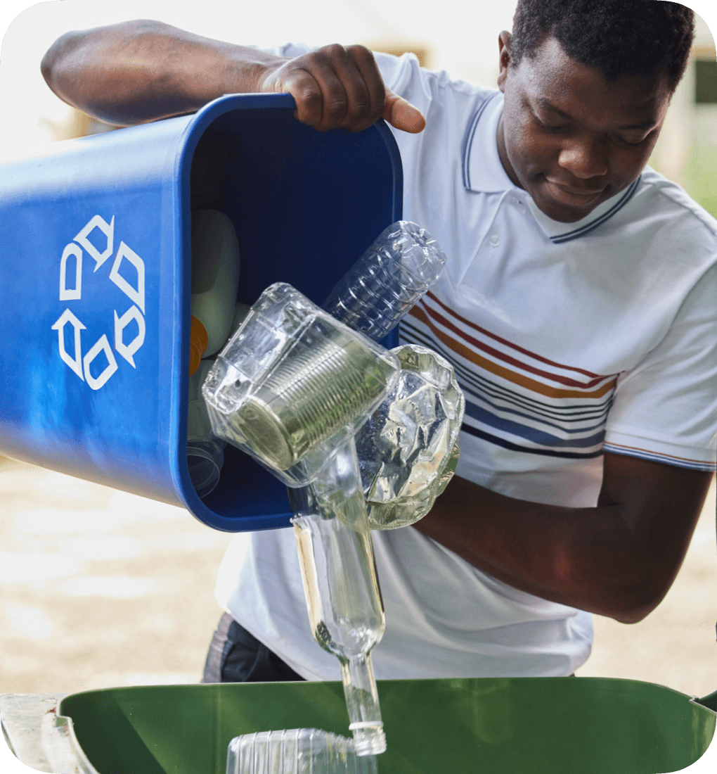 Young african american man sorting trash