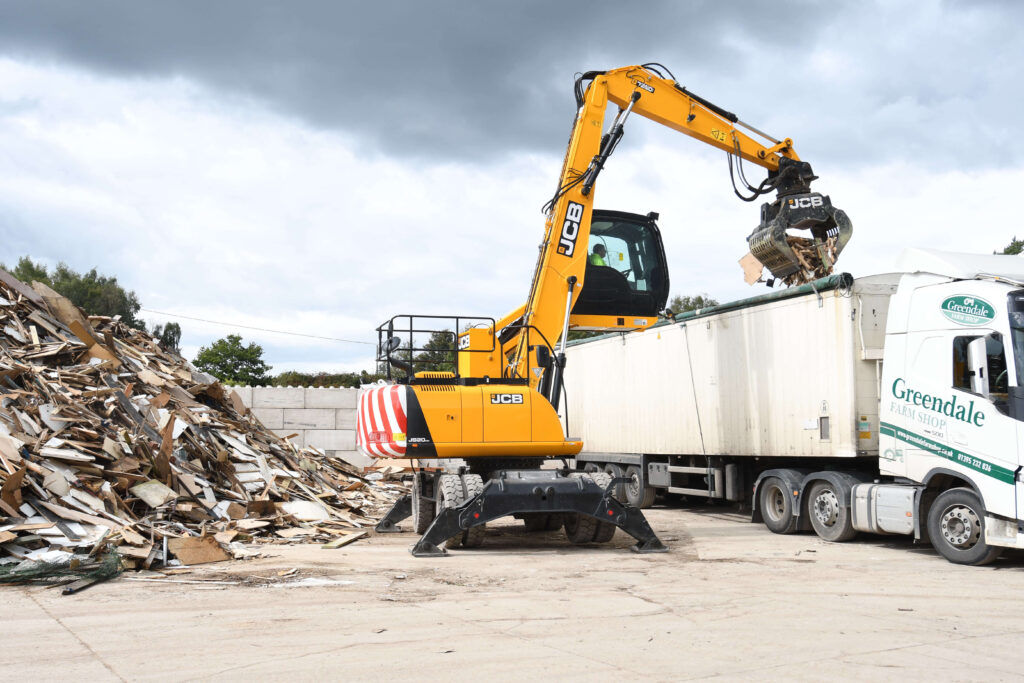 sorting waste at the waste group tipping facility