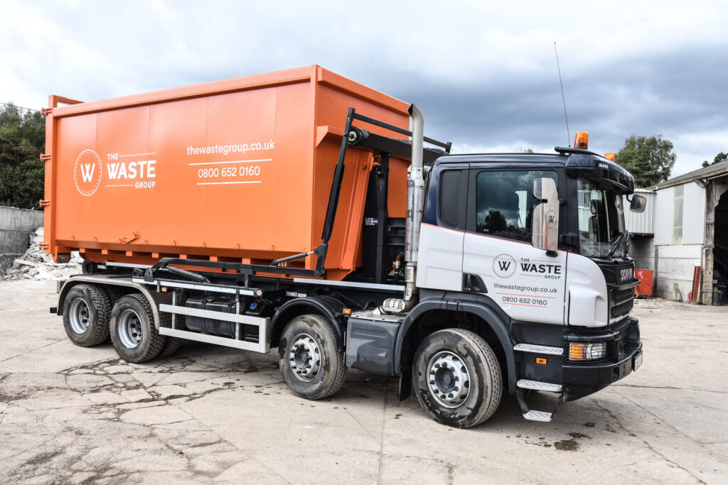 the waste group truck with a container