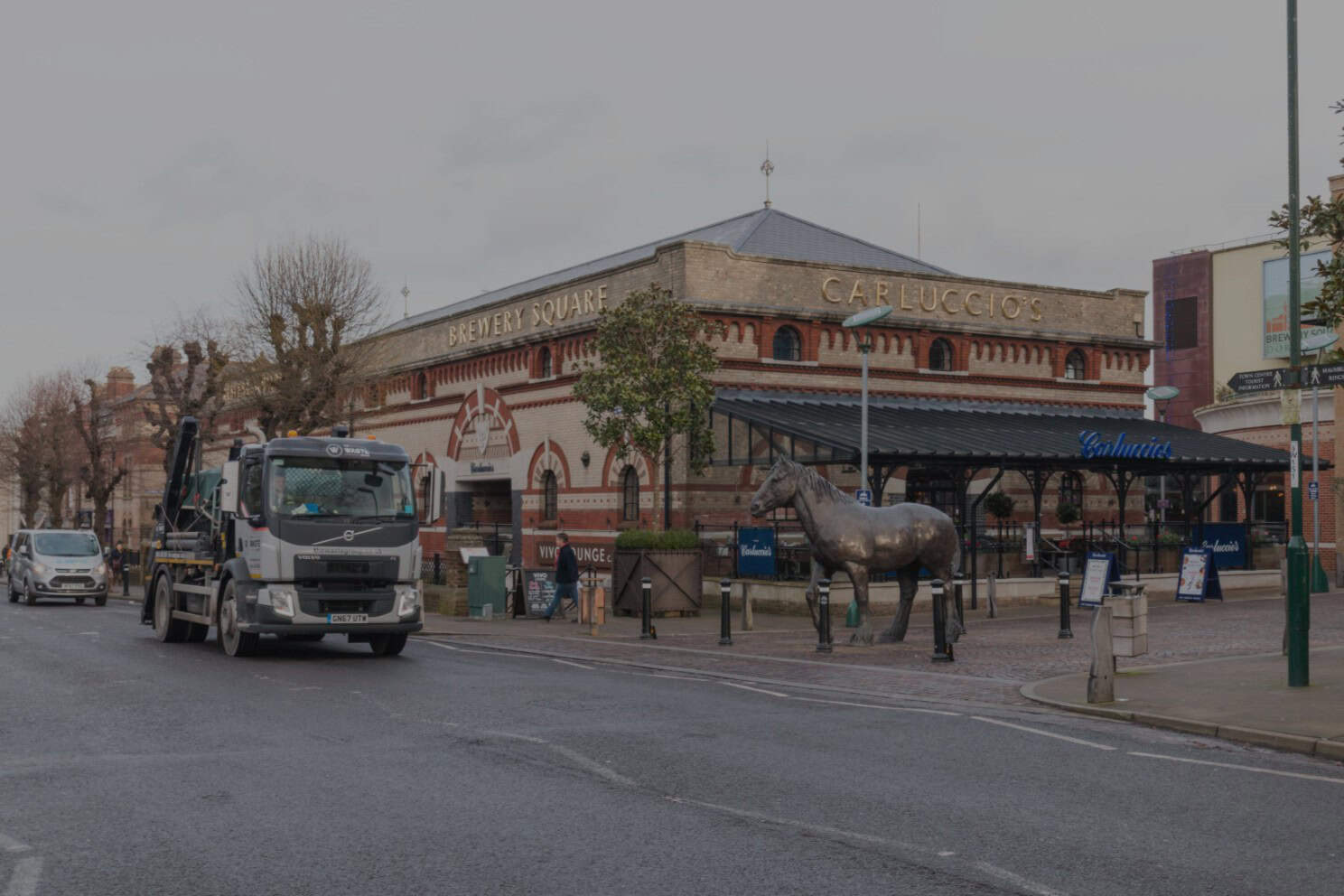 Skip hire Dorchester — The Waste Group skip lorry at Brewery Square