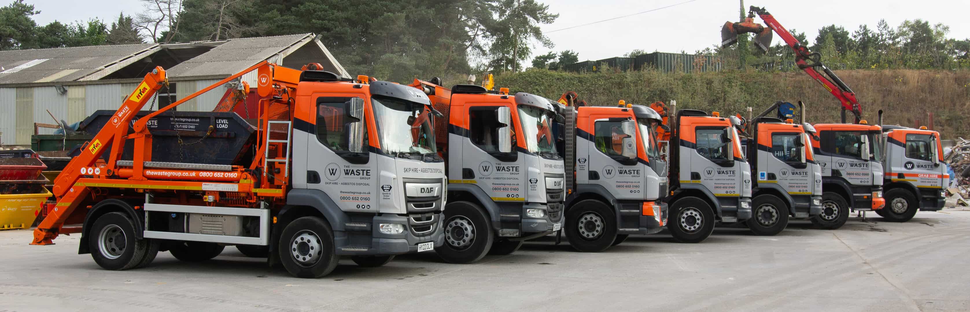 Skip hire Wareham — The Waste Group fleet of skip lorries at Hines Pitt depot, Wareham, Dorset