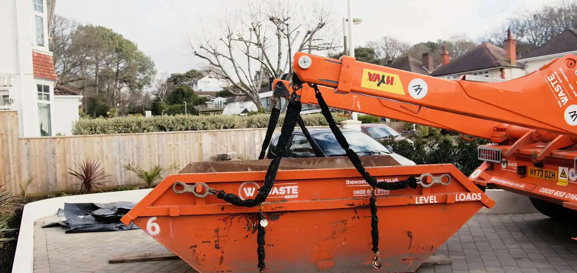 The Waste Group 6 yard skip being delivered to a Bournemouth residential property