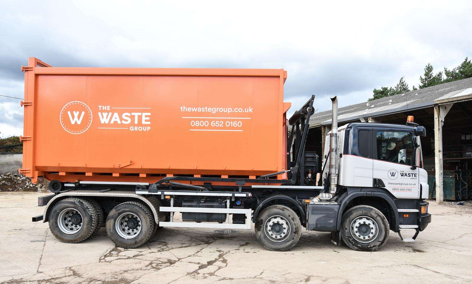 The Waste Group hook-lift lorry carrying a RoRo skip at our Wareham depot — RoRo skip hire prices in Bournemouth and Poole